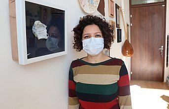 Kovid-19'a sanatla dikkati çekmek için porselenden maske yapıyor