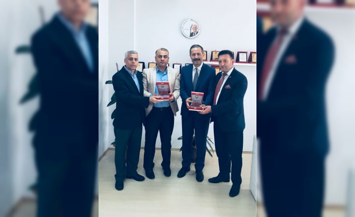 SASKİ'de Yeşilyurt ve Gayretli'ye teşekkür plaketi