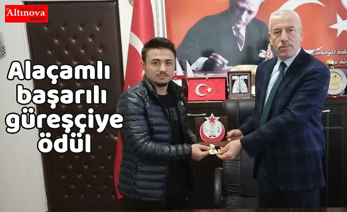 Alaçamlı başarılı güreşçiye ödül