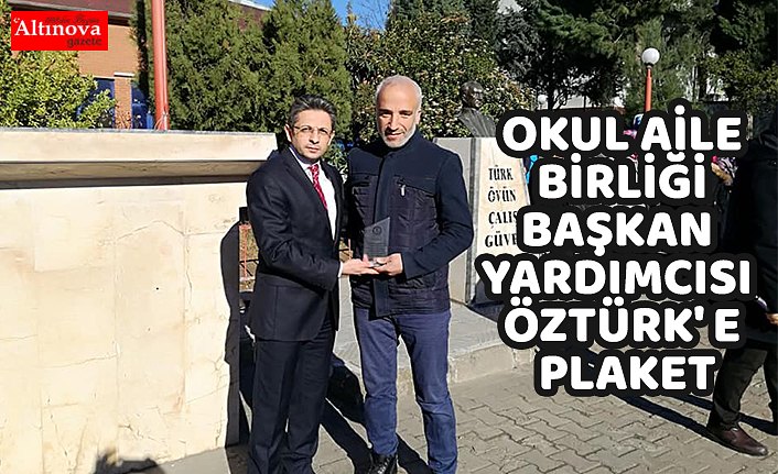 OKUL AİLE BİRLİĞİ BAŞKAN YARDIMCISI ÖZTÜRK' E PLAKET