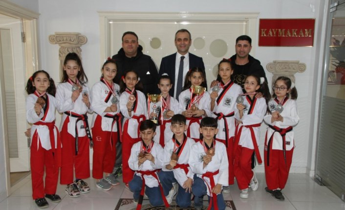 Başarılı sporculardan Kaymakam Ahmet Adanur'a ziyaret