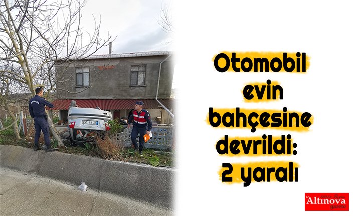 Otomobil evin bahçesine devrildi: 2 yaralı