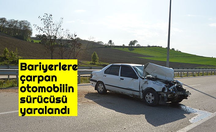 Bariyerlere çarpan otomobilin sürücüsü yaralandı