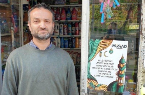 Trabzon'da MÜSİAD üyeleri bakkalların veresiye defterlerindeki borçları ödüyor