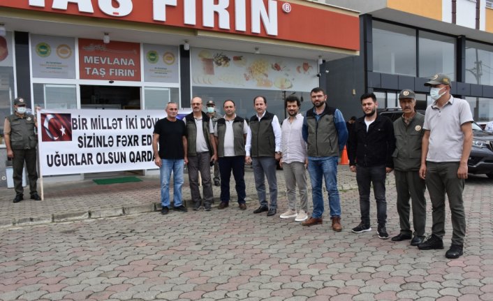 Muğla'da orman yangını söndürme çalışmalarına destek veren Azerbaycanlı itfaiyeciler, Trabzon'da coşkuyla karşılandı