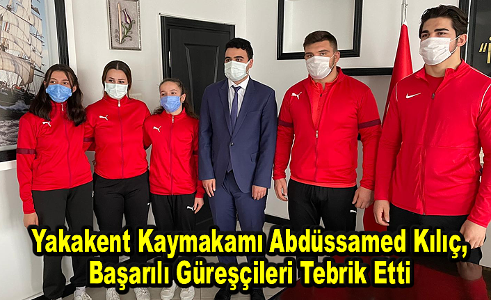 Yakakent Kaymakamı Abdüssamed Kılıç, başarılı güreşçileri tebrik etti