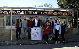 Üniversite öğrencilerine kalem ve lokum