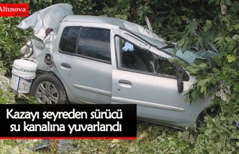 Kazayı seyreden sürücü su kanalına yuvarlandı