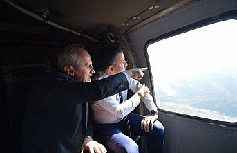 Bakanlar Turhan ve Pakdemirli, Yusufeli Barajı'nı helikopterle havadan inceledi
