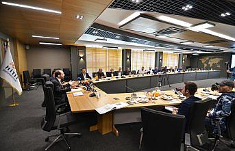 Erol Olçok'un ismi senato salonuna verildi