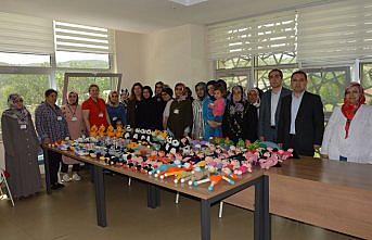 Suriyeli yetimlere örgü bebek ve eşofman