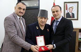 Kıbrıs gazisine madalya ve berat verildi