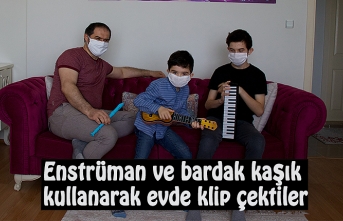 Enstrüman ve bardak kaşık kullanarak evde klip çektiler