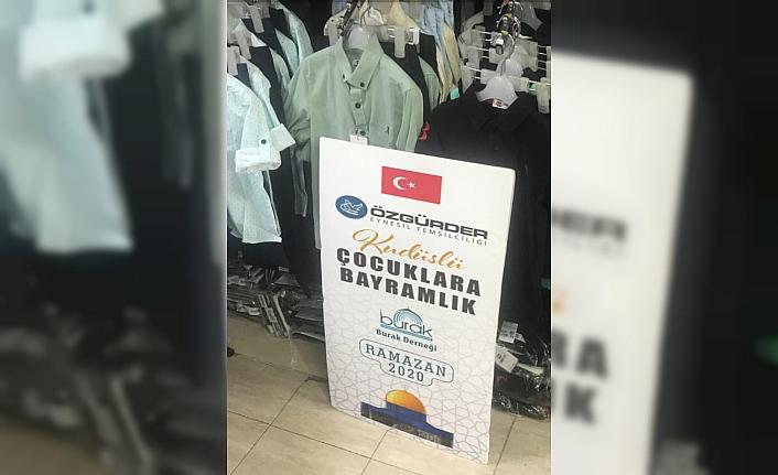 Kudüslü ve Eynesilli yetimlere kıyafet ve ayakkabı hediye edildi
