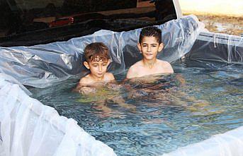 Pikap aracının kasasını havuz çevirdi