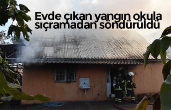 Evde çıkan yangın okula sıçramadan söndürüldü