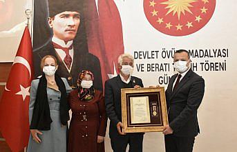 Gümüşhane'de bir gaziye Devlet Övünç Madalyası takdim edildi