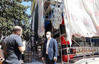 Akçaabat'ta bazı caddelerdeki binaların cephe düzenleme çalışmalarına başlandı