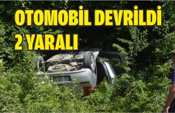 OTOMOBİL DEVRİLDİ 2 YARALI