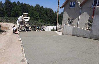 Korgan'da asfalt ve beton yol çalışması yürütülüyor