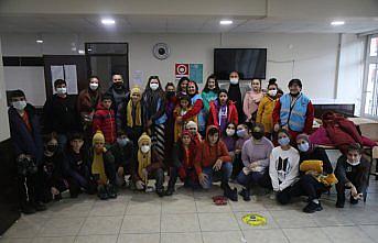 Sel felaketinden etkilenen çocuklara gurbetçi kadınlardan giyecek yardımı