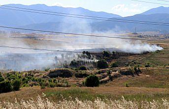 Karabük'te otluk ve ağaçlık alanda çıkan yangın söndürüldü