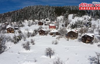 Kastamonu'nun tarih kokan ahşap evleri karla kaplandı