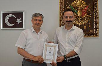Türkiye Diyanet Vakfı'dan Havza Kaymakamı Ayvat'a teşekkür belgesi