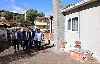 Çorum'da yangında evlerini kaybeden aileler yeni evlerine kavuştu