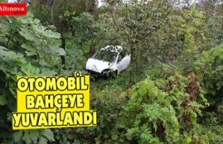 OTOMOBİL BAHÇEYE YUVARLANDI