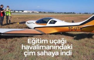 Eğitim uçağı havalimanındaki çim sahaya indi