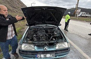 Karabük'te seyir halindeki otomobilde çıkan...