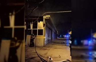 Serviste park halindeki araçta çıkan yangın söndürüldü